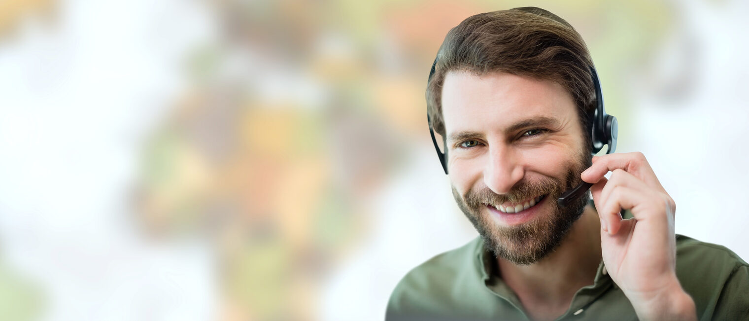Mann mit Kopfhörer, Callcenter