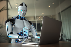 Roboter am Laptop und ein §-Zeichen